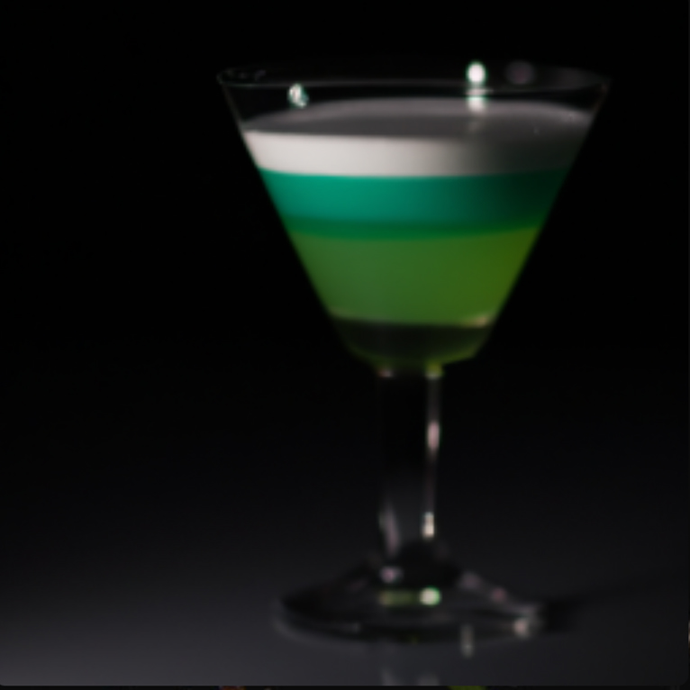 Compound V Cocktail made with Vodka, Midori Melon Liqueur, Absinthe and blue curacoa