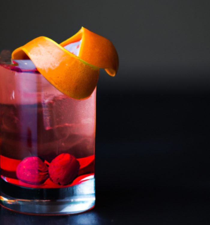 Enjoy a refreshing Raspberry Negroni Spritz, the perfect balance of sweet raspberry liqueur and bitter Campari, garnished with fresh raspberries and a zesty orange peel.